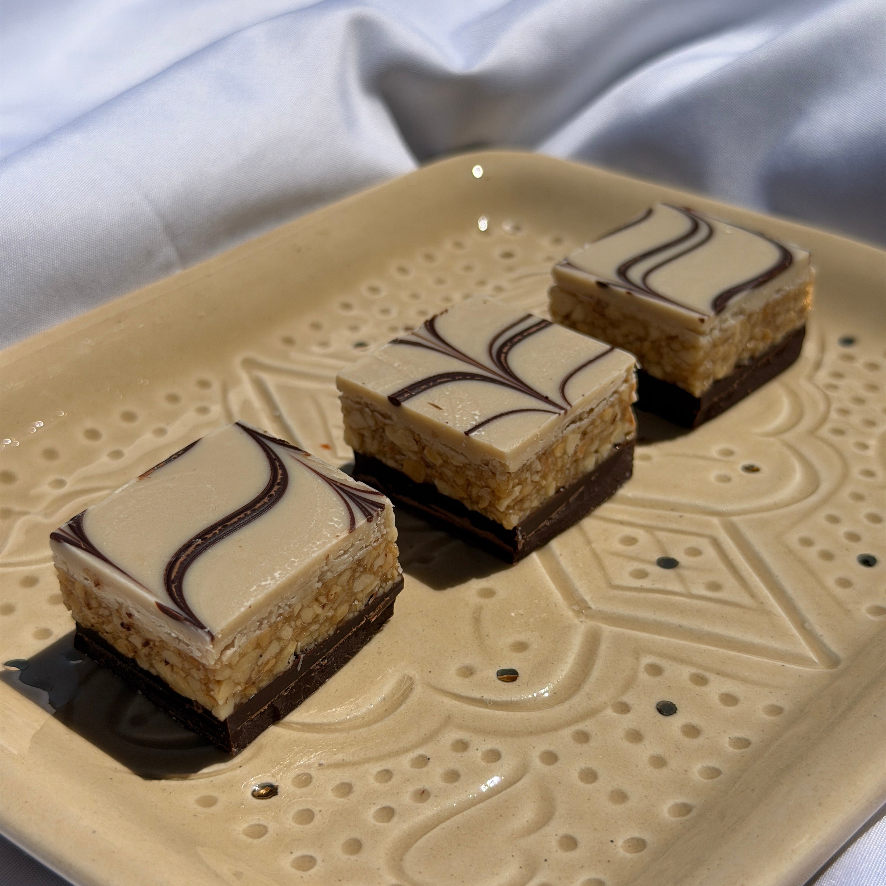 Zellige, a Moroccan confection made with nuts and chocolate and inspired by traditional tilework